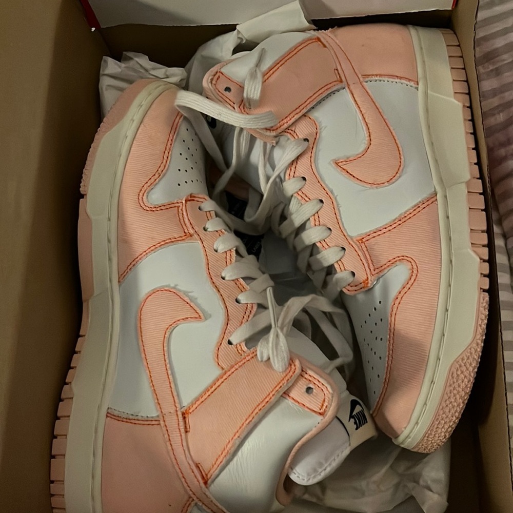 Brand new arctic orange women’s Nike high top dunks.